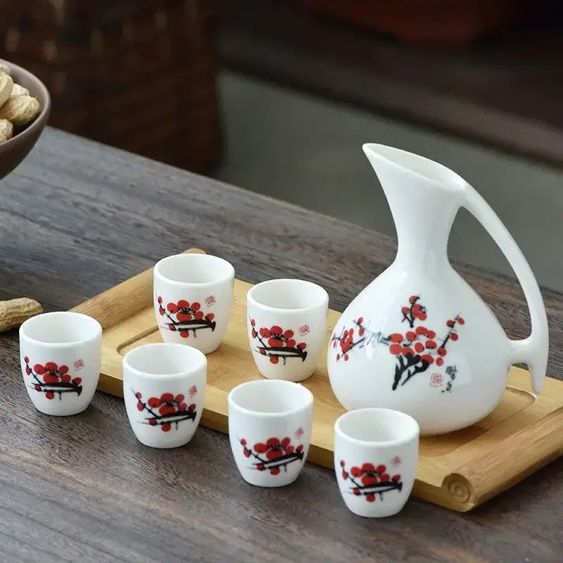 Antique white ceramic warming container with red plum blossom and black branch designs decorbites ceramic wine set