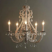 Antique white iron crystal chandelier with ornate metalwork and dangling crystals for dining room decorbites iron crystal lighting