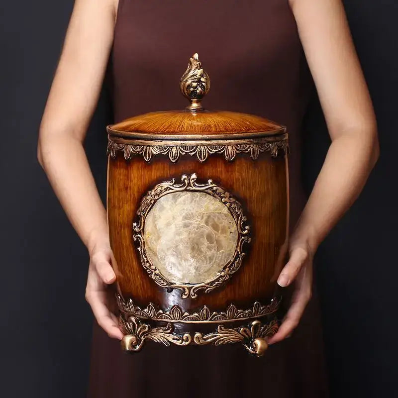 Antique style wooden covered trash can with brass accents and shell inlay for decorbites living room use