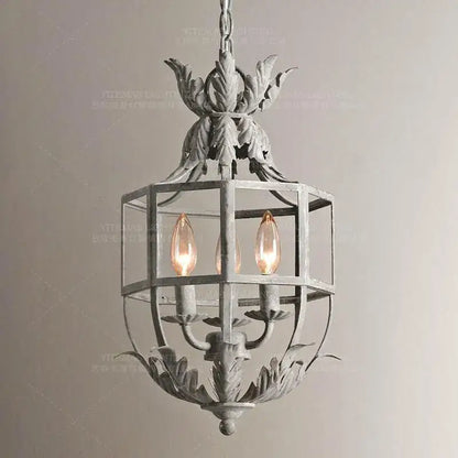 Antique wrought iron elegant candle chandelier with distressed gray finish and ornate leaf motifs for dining room decorbites elegant candle lighting