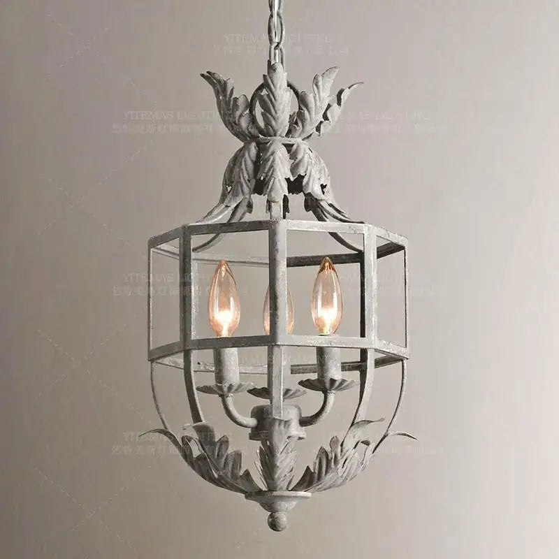 Antique wrought iron elegant candle chandelier with distressed gray finish and ornate leaf motifs for dining room decorbites elegant candle lighting