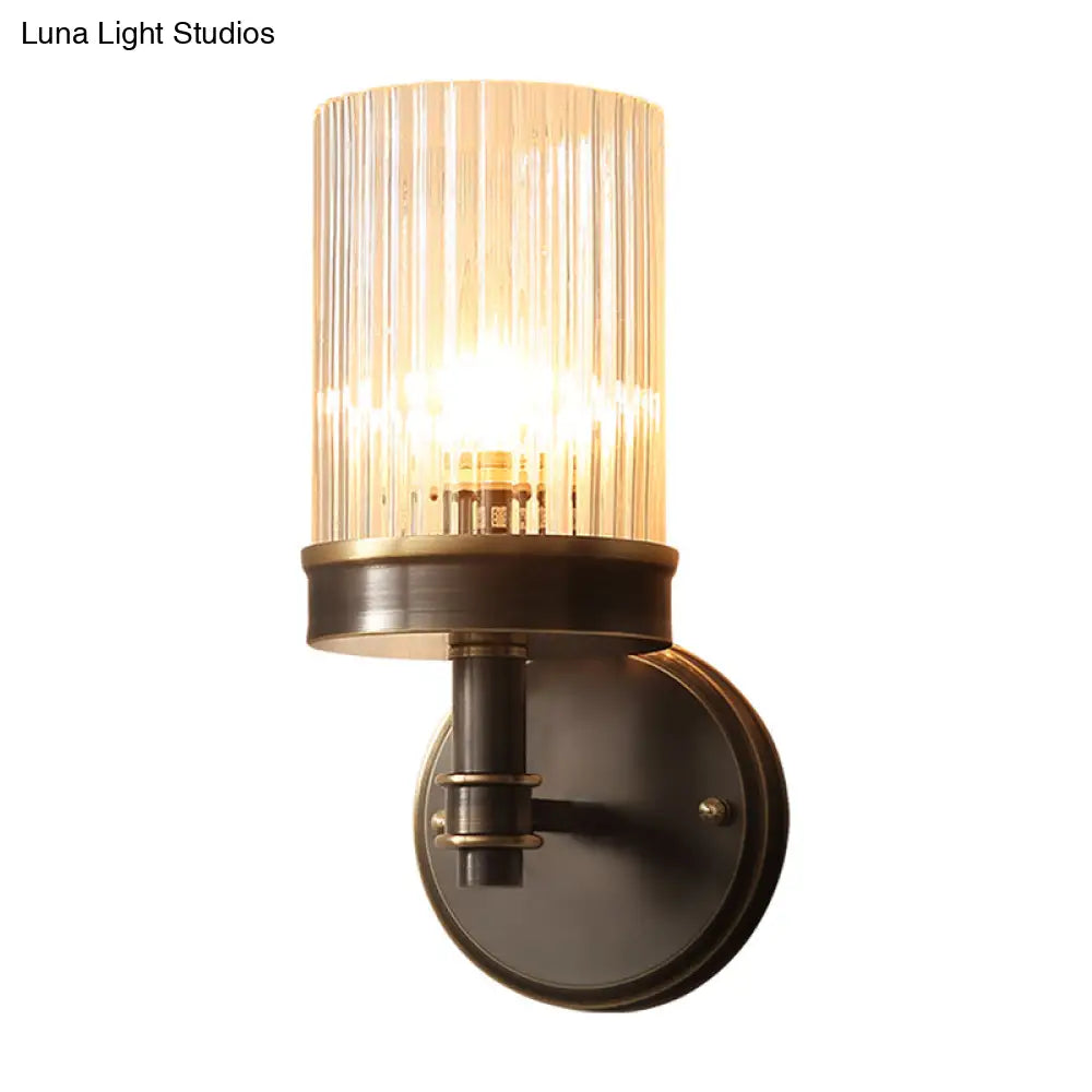 Aplique de pared de cristal negro envejecido con pantalla cilíndrica transparente - Ideal para el dormitorio