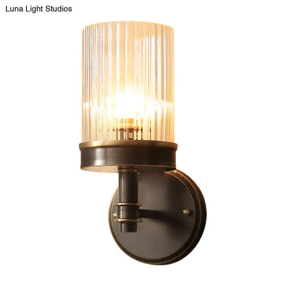 Aplique de pared de cristal negro envejecido con pantalla cilíndrica transparente - Ideal para el dormitorio