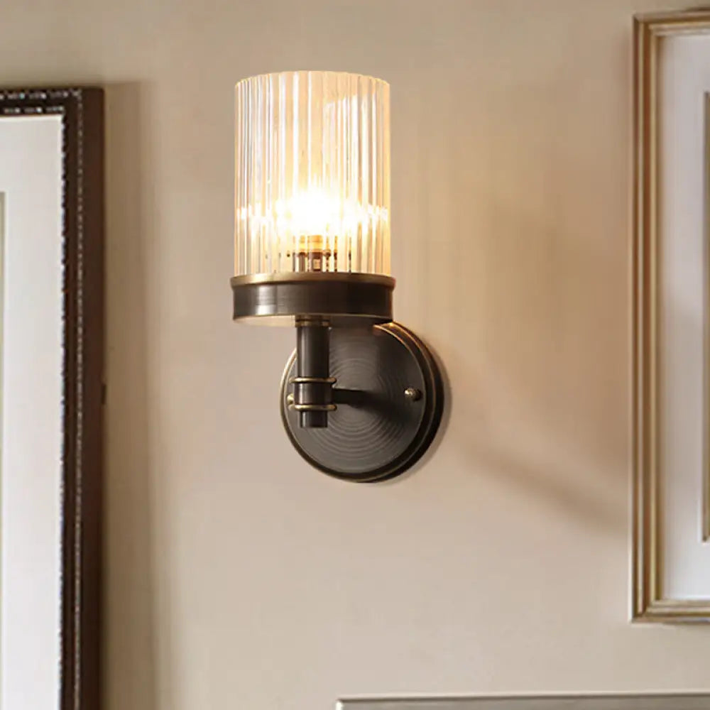 Aplique de pared de cristal negro envejecido con pantalla cilíndrica transparente - Ideal para el dormitorio