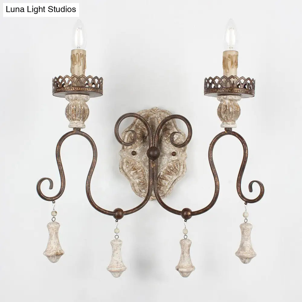 Lámpara de pared estilo vela en bronce envejecido: perfecta para la iluminación del dormitorio