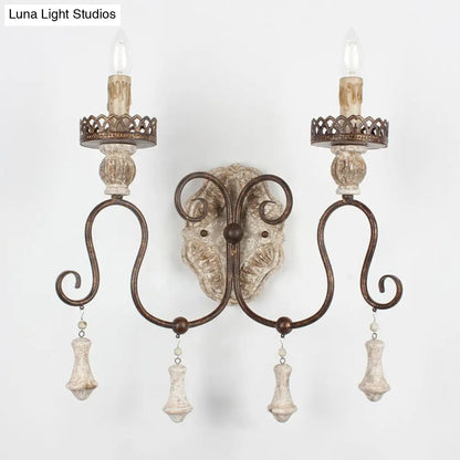 Lámpara de pared estilo vela en bronce envejecido: perfecta para la iluminación del dormitorio