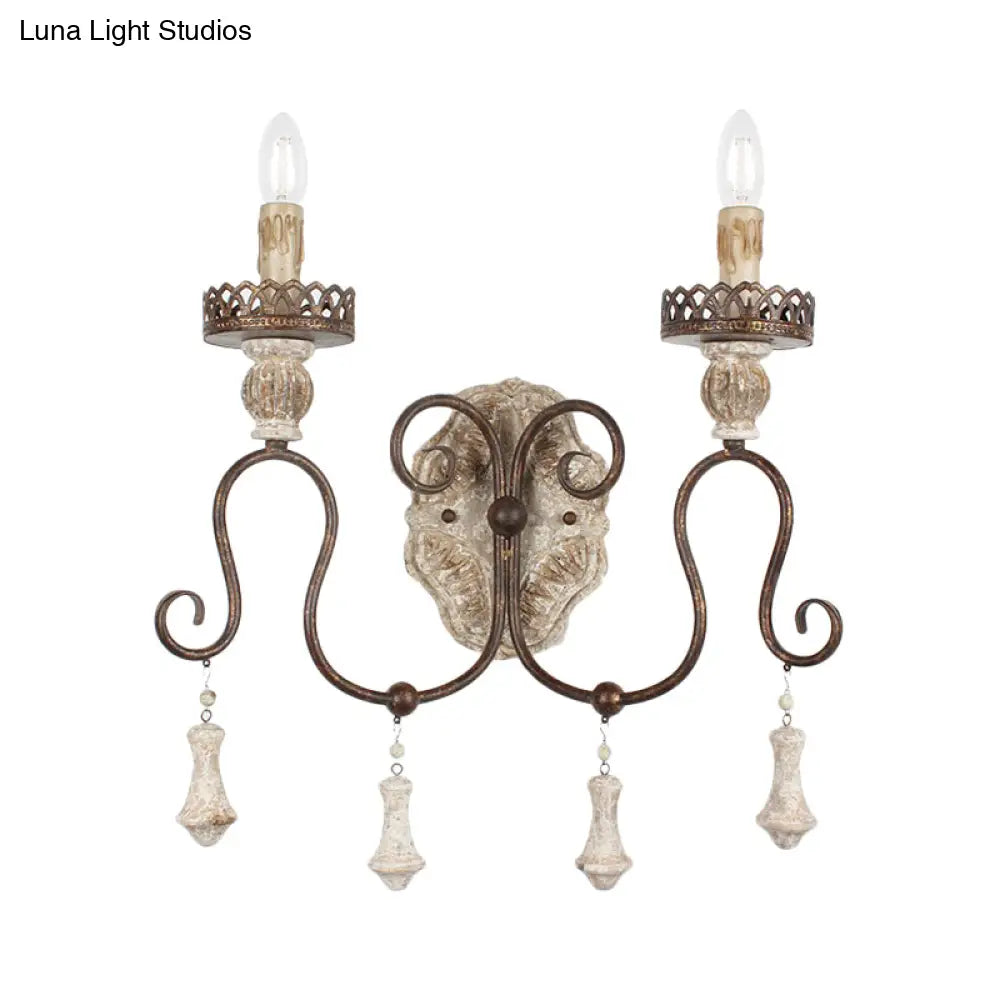 Lámpara de pared estilo vela en bronce envejecido: perfecta para la iluminación del dormitorio