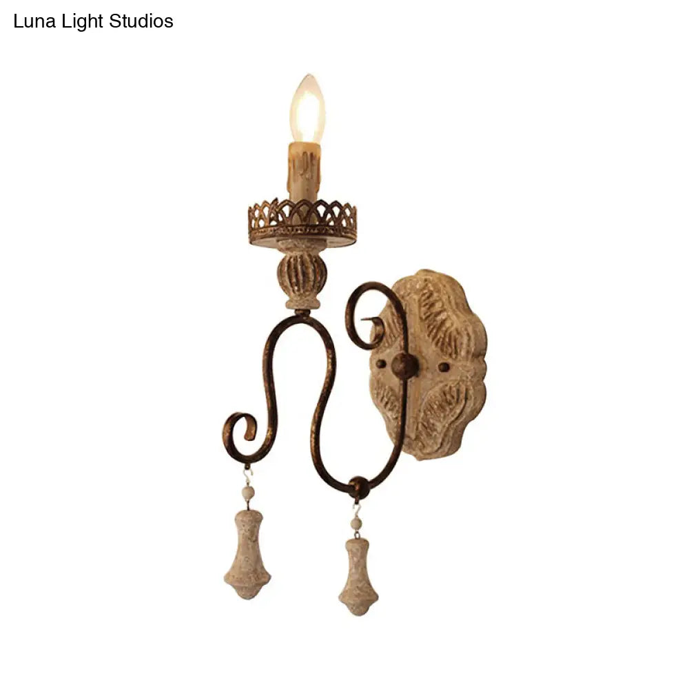 Lámpara de pared estilo vela en bronce envejecido: perfecta para la iluminación del dormitorio