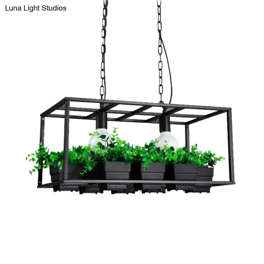 Black metal rectangular island lamp with two white bulbs, hanging ceiling light with green potted plants inside frame