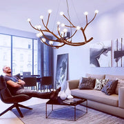 Antler style dark brown pendant light with frosted glass bubble led globes and textured metal frame for dining room decorbites glass bubble
