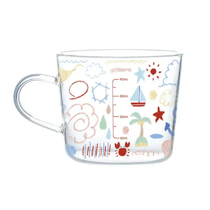 Clear glass 500ml glass mug with apricot and orange seaside pattern and measurement markings for kitchen use
