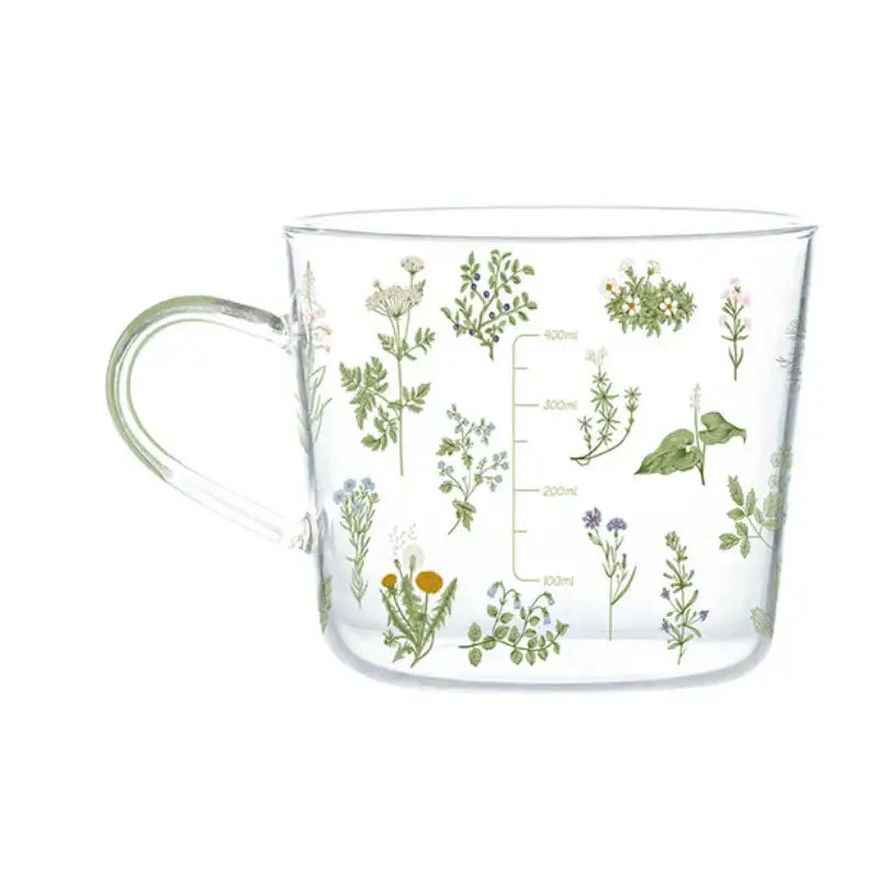 Clear glass 500ml glass mug with apricot and orange pattern and delicate botanical illustrations for breakfast use