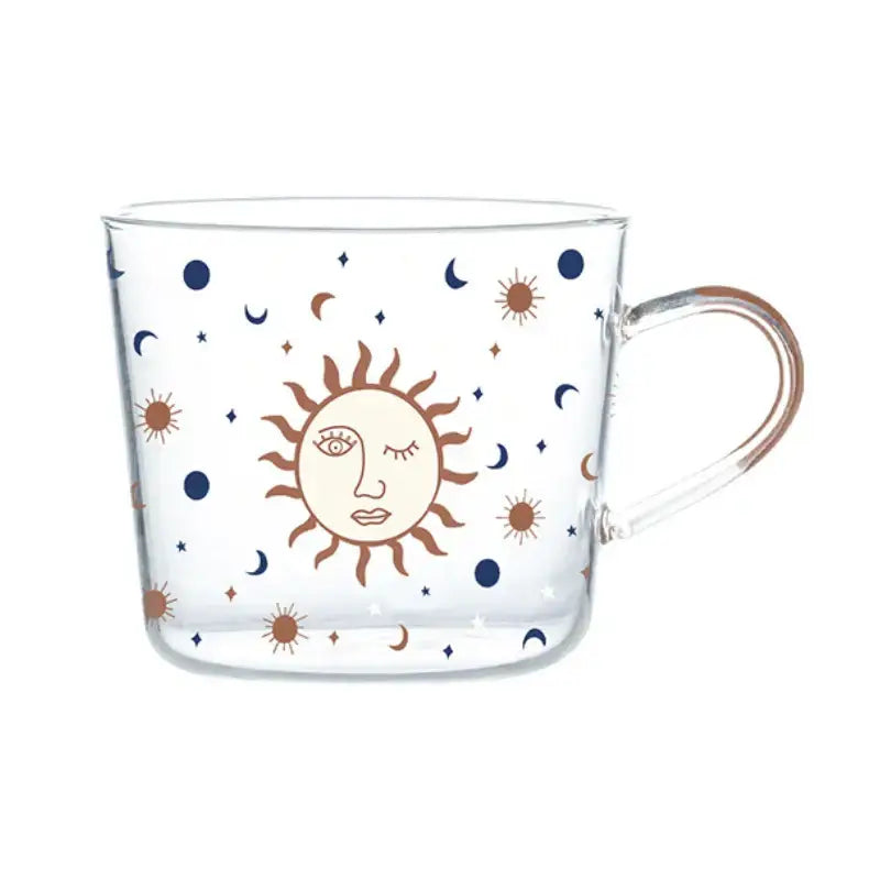 Clear 500ml glass mug with apricot and orange celestial pattern featuring sun face and stars for kitchen breakfast use