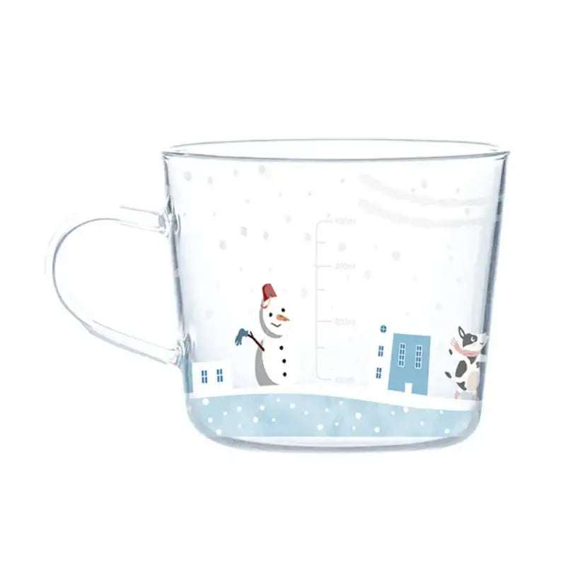 Clear 500ml glass mug with apricot and orange pattern featuring cartoon snowman blue buildings and cow design for breakfast