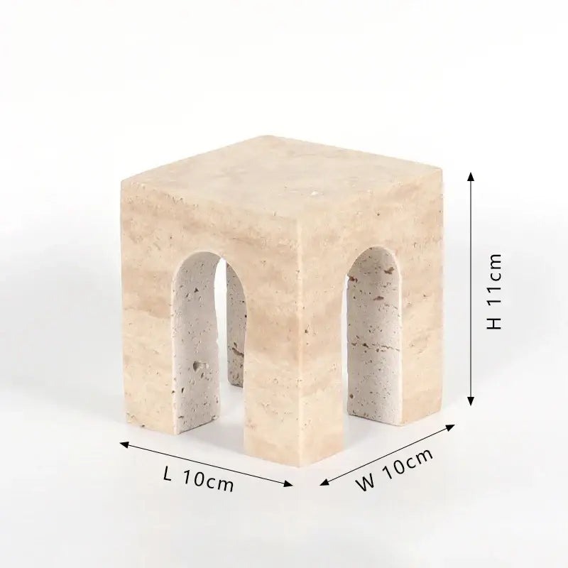 Beige travertine coffee table cabinet with two arched openings suitable as an architectural living room stool