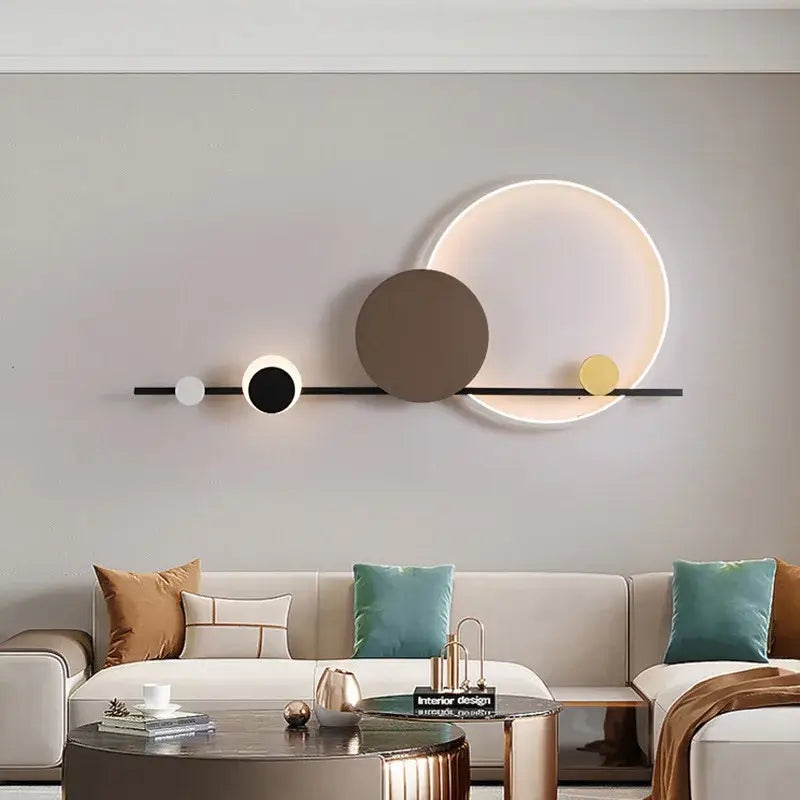 Modern art deco led circular wall sconce with black bar and white brown yellow illuminated circles for dining room decorbites art deco