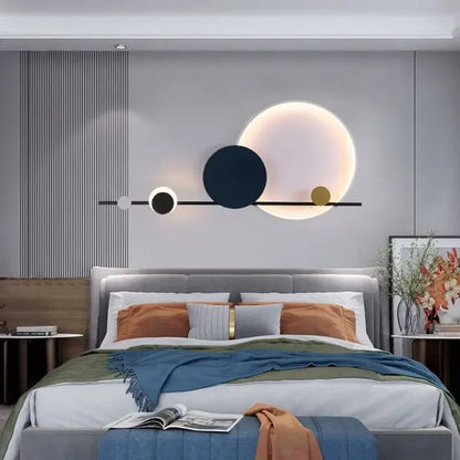 Art deco black and yellow circular led wall sconce with sleek horizontal bar and three illuminated discs for dining room decorbites art deco