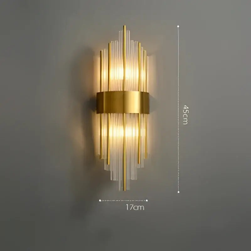 Art deco stainless wall sconce with gold tone, vertical glass rods, and central brass band, decorbites art deco design