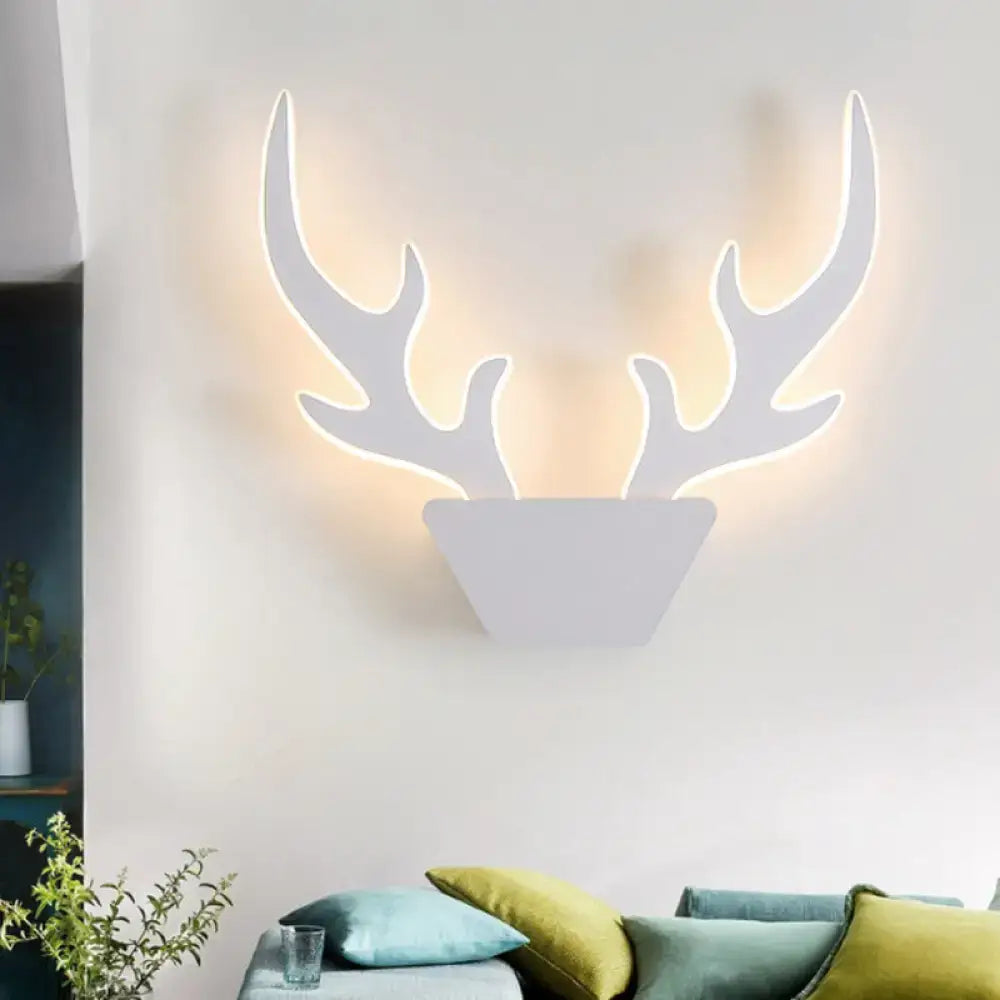White led art deco light fixture shaped like deer antlers with glowing outline for bedroom wall sconce inch fixture