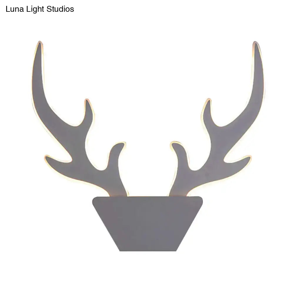 Gray metallic deer antler light fixture with art deco design in black and white for bedroom wall sconce use