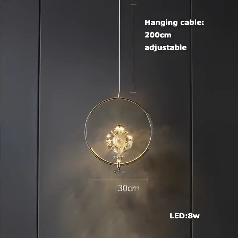 A modern art deco brass crystal led ceiling chandelier with a gold frame and eight led bulbs for dining room decorbites crystal led