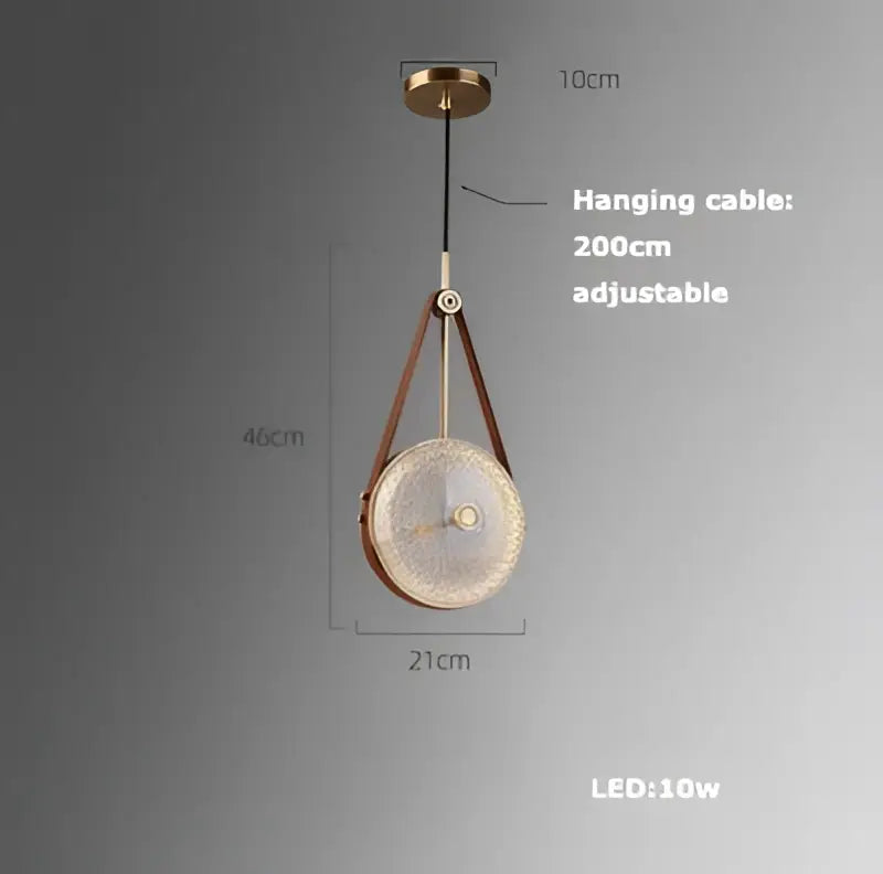 A modern art deco brass crystal led ceiling chandelier with circular textured glass shade and brown leather straps