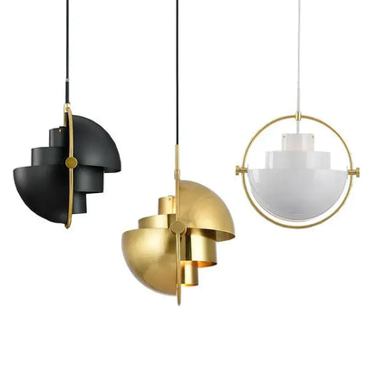 Three sleek art deco pendant lights with layered dome design in black gold and white for dining room use