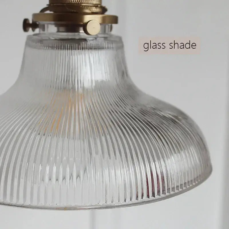 Art deco brass glass retro chandelier featuring a clear ribbed glass lampshade with a brass fixture for dining room decorbites brass glass pendant light