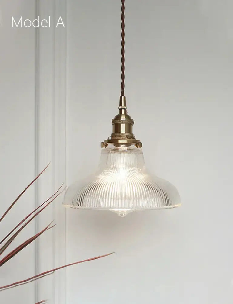 Model a vintage-style glass retro chandelier pendant light with clear ribbed shade and decorbites brass glass finish