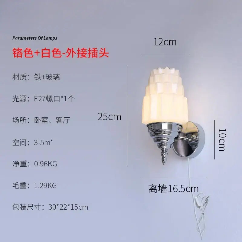 A sleek art deco wall lamp with tiered cream glass led shades and chrome metal base for bedroom decorbites cream glass
