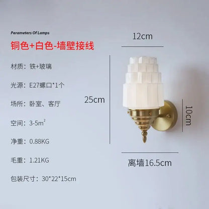 Art deco cream glass led wall lamp with tiered white glass shade and brass-colored metal base for bedroom decorbites cream glass
