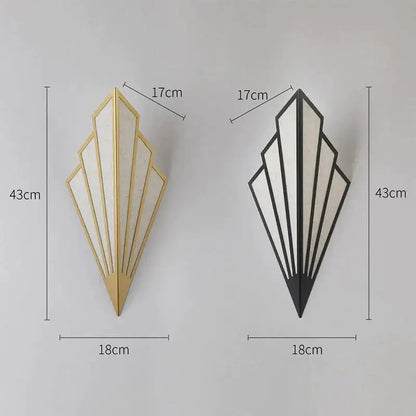 Art deco gold diamond shape modern wall light with geometric fan design, black metal frame, and frosted glass panels for bedroom