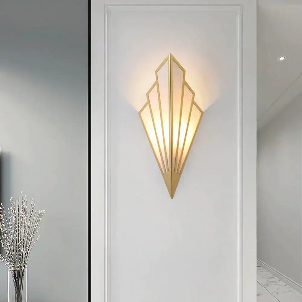 Art deco gold diamond shape modern wall light with geometric fan design and frosted glass panels for bedroom