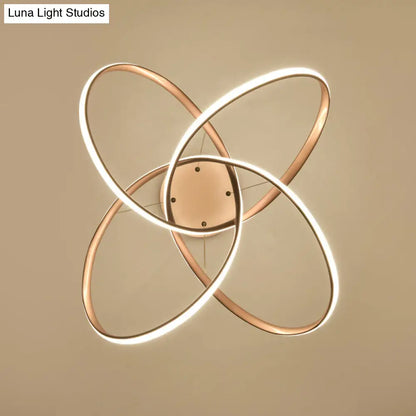 Lámpara de techo LED Art Déco dorada con motivos florales - Elegante lámpara colgante de metal para el comedor