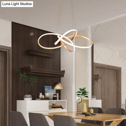 Lámpara de techo LED Art Déco dorada con motivos florales - Elegante lámpara colgante de metal para el comedor