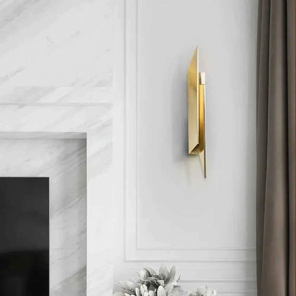 Art deco gold geometric wall lamp with metallic finish and sleek modern design for bedroom lighting