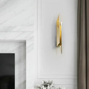 Art deco gold geometric wall lamp with metallic finish and sleek modern design for bedroom lighting