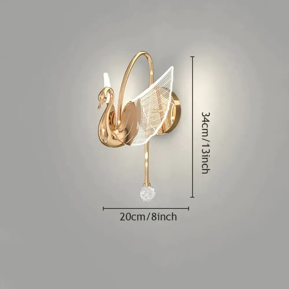 Art deco gold swan wall lamp with mesh wing and crystal accent for elegant bedroom bedside wall lighting
