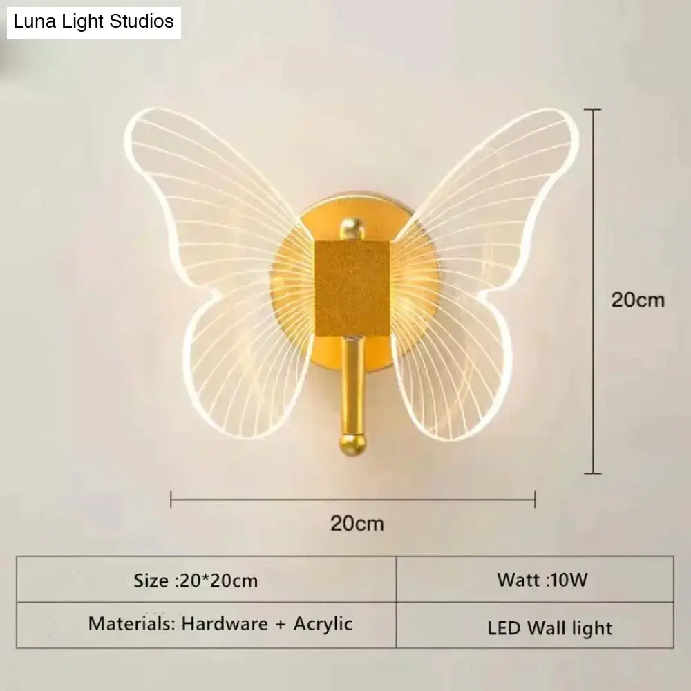 Gold-toned butterfly-shaped led wall lamp with translucent acrylic wings for bedroom bedside wall lighting