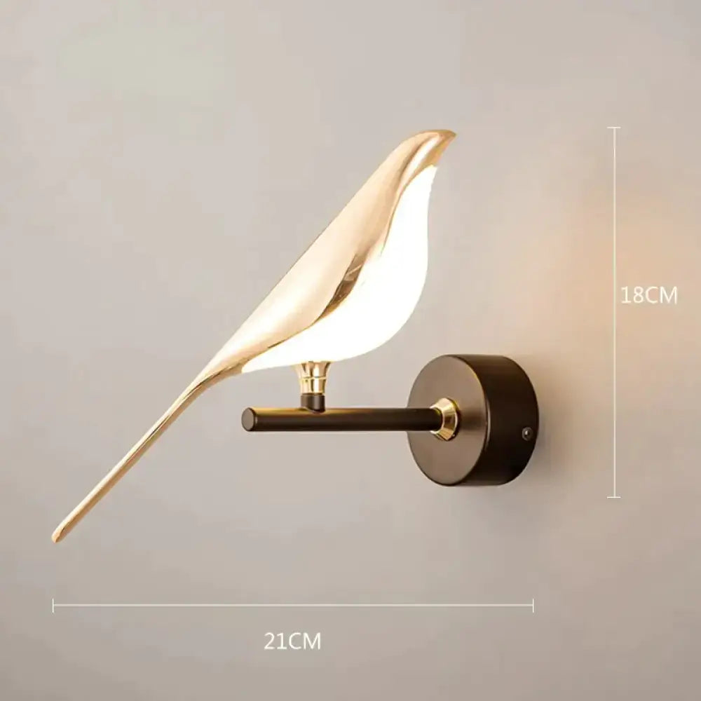 Gold-toned art deco swan wall lamp with crystal and warm light for bedroom bedside wall illumination