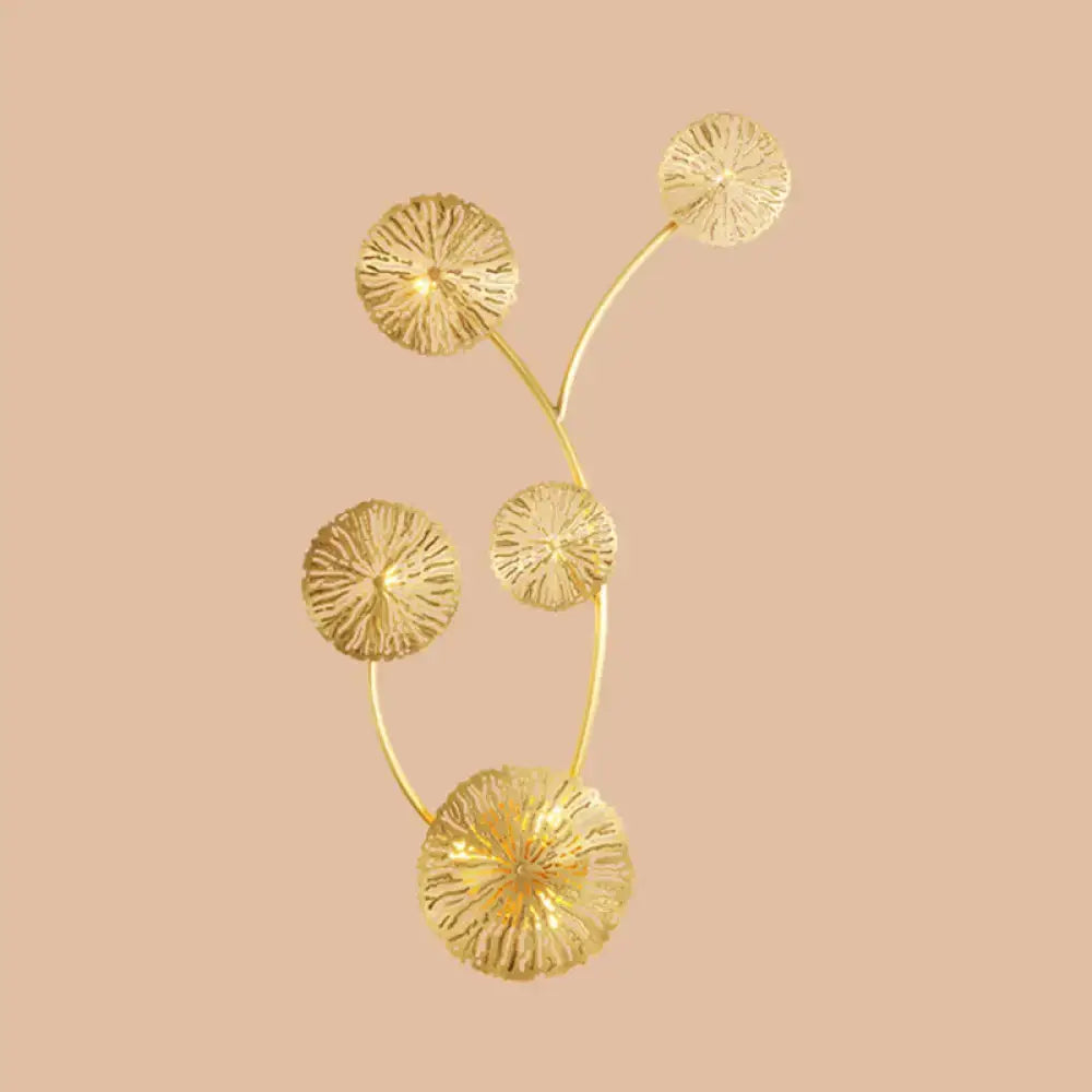 Golden metal art deco wall mount light fixture with intricate dandelion textured coral design for bedroom sconce
