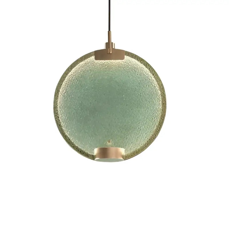Art deco lavender glass horo led pendant light featuring a round textured green glass pendant light with brass accents
