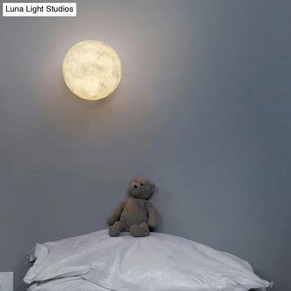 DecorBites™ DecorBites™ Art Deco LED Sconce Light: White Moon Flush Mount Wall Fixture with Resin Shade