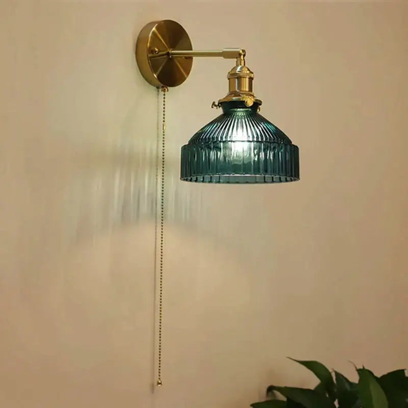Art deco led wall lamp with brass sconce and teal-green ribbed glass shade by decorbites for bedroom decor