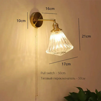 Vintage-style brass art deco led wall lamp with faceted crystal glass shade and pull chain switch by decorbites