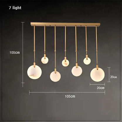 Art deco marble golden lustre pendant light with gold-toned chandelier and seven frosted glass shades for dining room