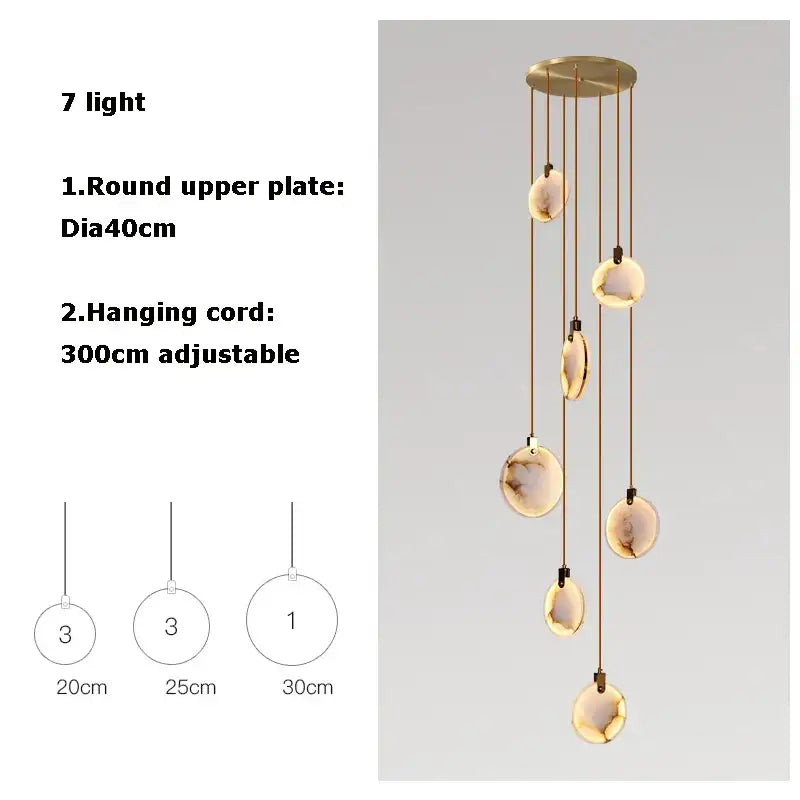 Art deco marble golden lustre pendant light with seven amber stone-like globe shades for dining room lighting