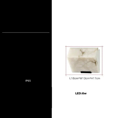 A sleek white marble art deco wall sconce with gray veining and modern minimalist decorbites art deco design