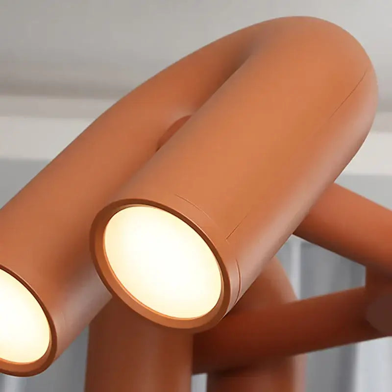 Art deco metal industrial chandelier with terracotta cylindrical pendant lights for modern dining room decorbites art deco