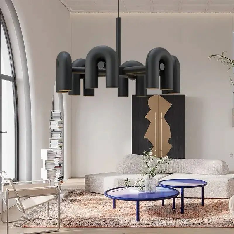 Black art deco metal industrial chandelier with curved pipe-like arms minimalist design for dining room decorbites art deco